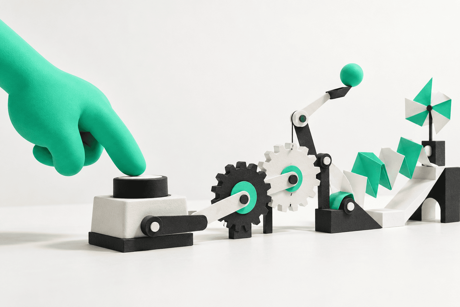 Mint hand approaching a simple interactive prototype with connected paper mechanisms.